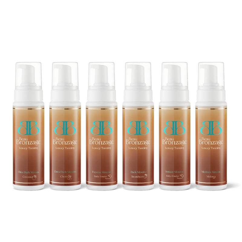 The full shade range of Beau Bronzage 200ml tanning mousses, in shades Instant, Express, Medium, Dark, Extra Dark and Ultra Dark